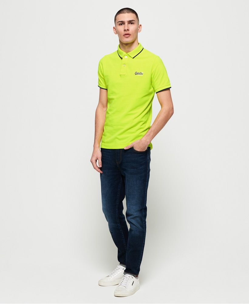 Superdry men's Hyper Classic pique polo shirt. This classic pique polo shirt features a two button fastening, split side seams and is completed with an embroidered Superdry logo on the chest.