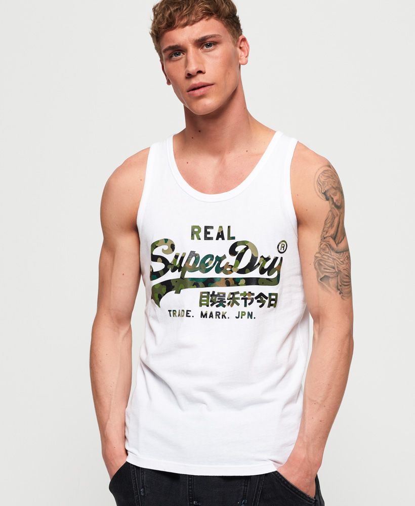 Superdry men's Vintage Logo layered camo lite vest top. This classic vest top features a camo effect logo design on the chest and will be the perfect partner to shorts and trainers this season.