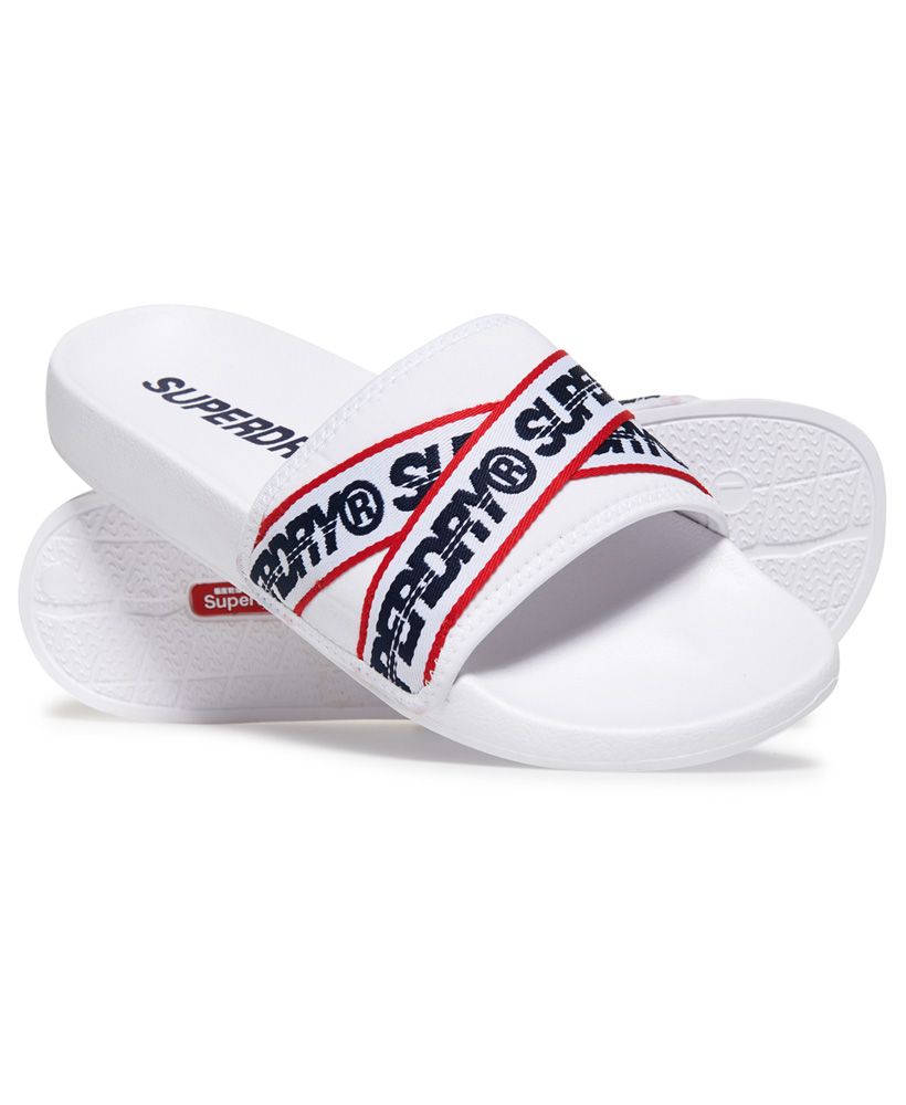 Superdry men's City beach sliders. A must have summer shoe, these sliders are your poolside essential. Lightweight in style, they feature a wide front strap, moulded sole for your comfort and branded taping across the front. The sliders are completed with a logo design on the sole.S - UK 6-7, EU 40-41, US 7-8M - UK 8-9, EU 42-43, US 9-10L - UK 10-11, EU 44-45, US 11-12XL - UK 12-13, EU 46-47, US 13-14
