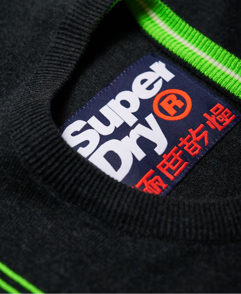 Superdry men's Speed logo crew jumper. This lightweight crew jumper features a large logo graphic on the chest and is completed with a logo tab on the hem. Style with jeans and trainers for an easy, off-duty look.