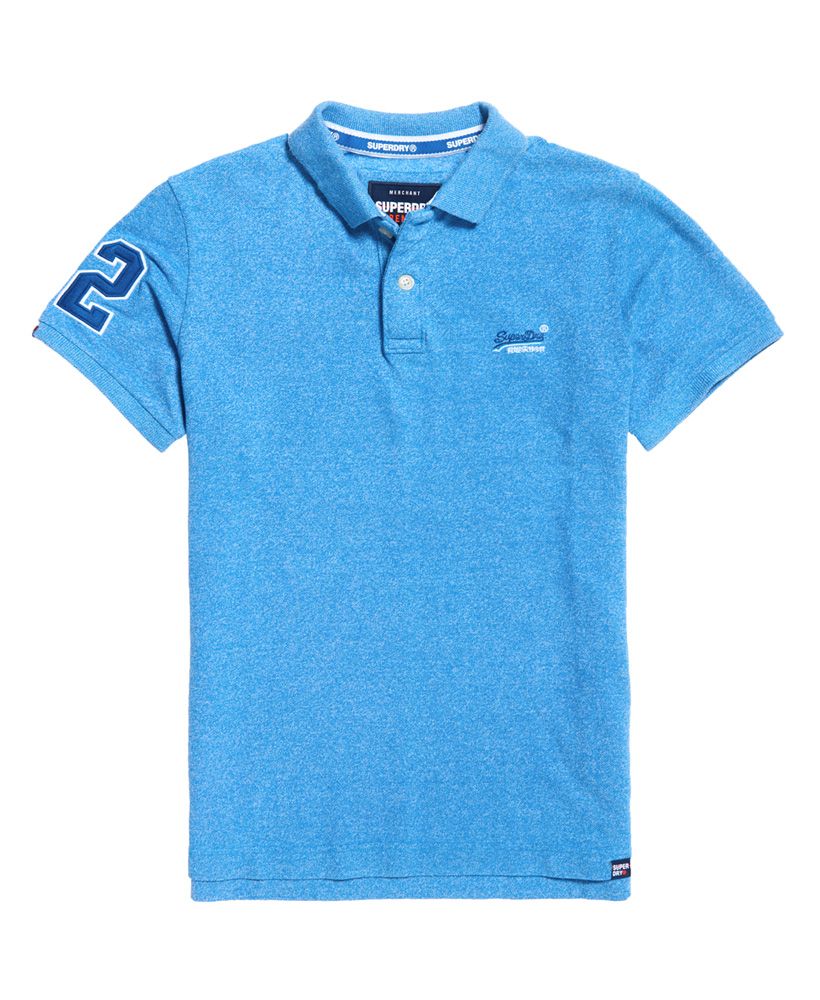 Superdry men's Classic pique polo shirt. Refresh your wardrobe this season with the Classic pique polo shirt, featuring a two button fastening, split side seams and embroidered logo design on the chest. The polo shirt is completed with a number graphic on one sleeve and small logo tab on the hem.Slim fit