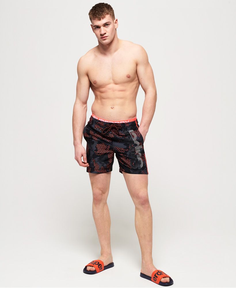 Superdry men’s Superdry state volley swim shorts. These high quality, quick dry swim shorts will give you freedom of movement and comfort for every length. They feature an elasticated waistband and a drawstring waist, three pockets including a zip back pocket and a full mesh lining. For the finishing touches, these shorts have been decorated with a Superdry branded waistband and a Superdry logo on the thigh.Please note due to hygiene reasons, we are unable to offer an exchange or refund on swimwear, unless they are sealed in their original packaging. This does not affect your statutory rights.