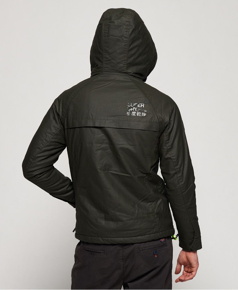 Superdry men’s Double Atlantic jacket. Taking inspiration from maritime styling, the Double Atlantic jacket is made from a coated cotton fabric and features a double layer zip fastening with a hook and loop storm flap and clips for added stability, a double layer hood, two front zipped pockets and popper cuffs. Inside, the jacket has a fully fleece lined body with fleece lining in both hoods. The jacket also has a single inside pocket. The Double Atlantic jacket is finished with a rubber Superdry logo badge on the sleeve, an acrylic Superdry logo on the shoulder and a metal Superdry logo on the chest.