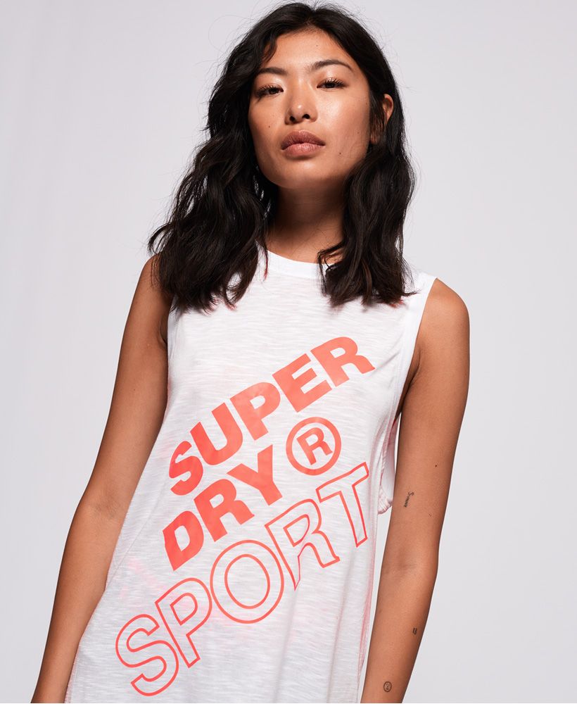 Superdry women’s Sport boyfriend layer tank top. Designed using moisture wicking, breathable technology fabric, this boyfriend fit tank top is perfect for when you’re working out. This tank top features a rear mesh layer, perfect for ventilation and is finished with a metallic Superdry Sport logo across the front.A classic fit. Not too slim, not too tight – no distractions here