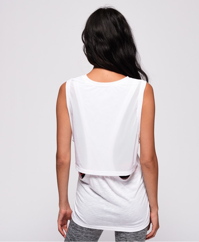 Superdry women’s Sport boyfriend layer tank top. Designed using moisture wicking, breathable technology fabric, this boyfriend fit tank top is perfect for when you’re working out. This tank top features a rear mesh layer, perfect for ventilation and is finished with a metallic Superdry Sport logo across the front.A classic fit. Not too slim, not too tight – no distractions here