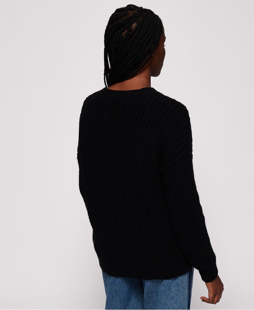 Superdry women's Off Beat Rodeo handcraft knit jumper. This soft touch jumper features a ribbed neckline and cuffs, a flower embroidered design and embroidered Superdry logo across the chest. Finished with a Superdry logo tab on the hem.
