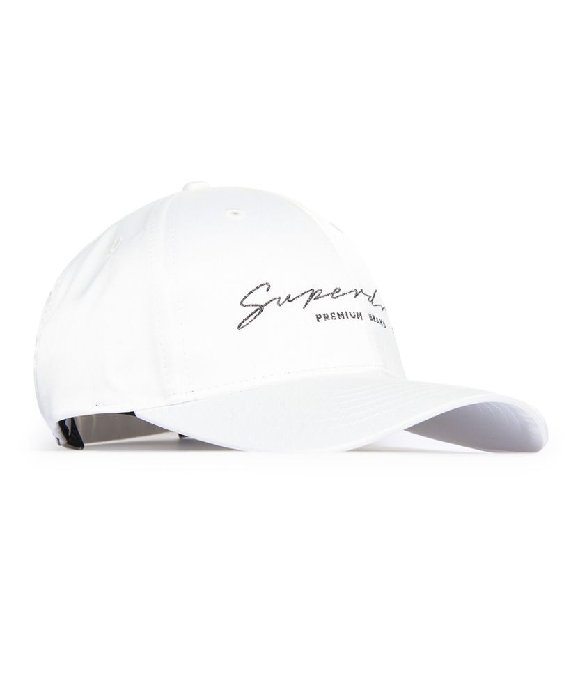 Superdry women's Portland cap. This minimalistic cap will look great with any outift. Simply designed with an embroidered Superdry script on the front with a subtle glitter effect, and a metal adjuster at the back.