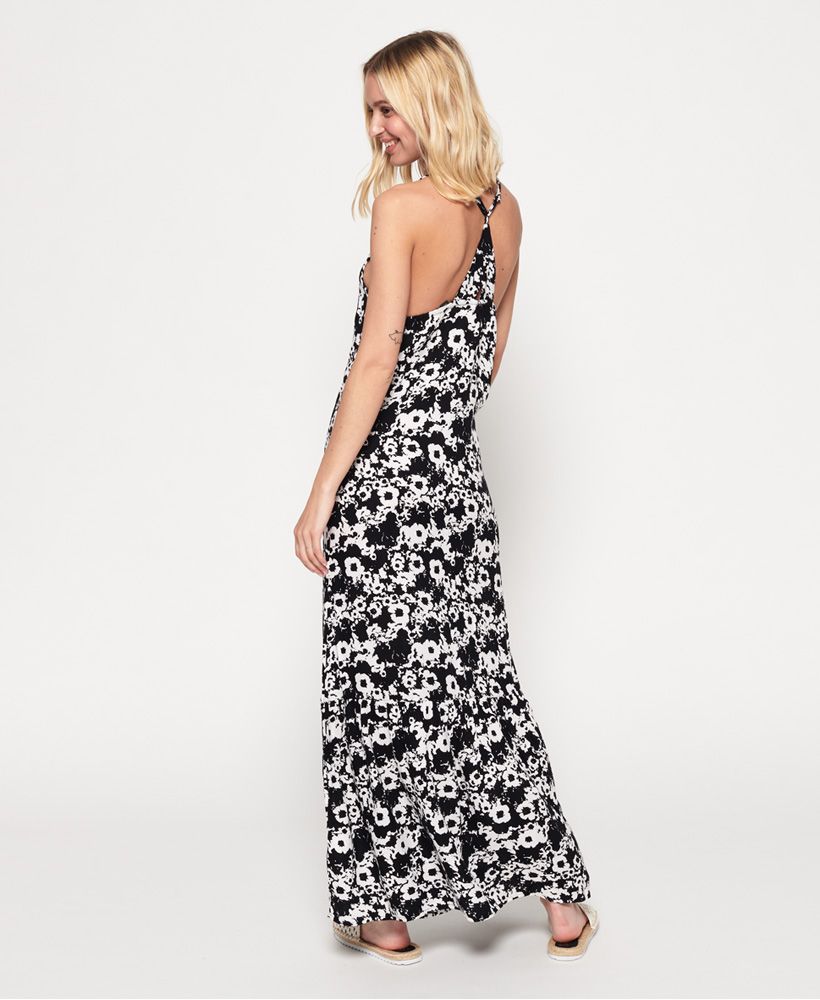 Superdry women’s Evee maxi dress. A feminine floaty maxi dress with adjustable shoulder straps and a racer back design. This elegant dress is perfect for this season and is finished with a subtle metal Superdry logo badge above the hem.