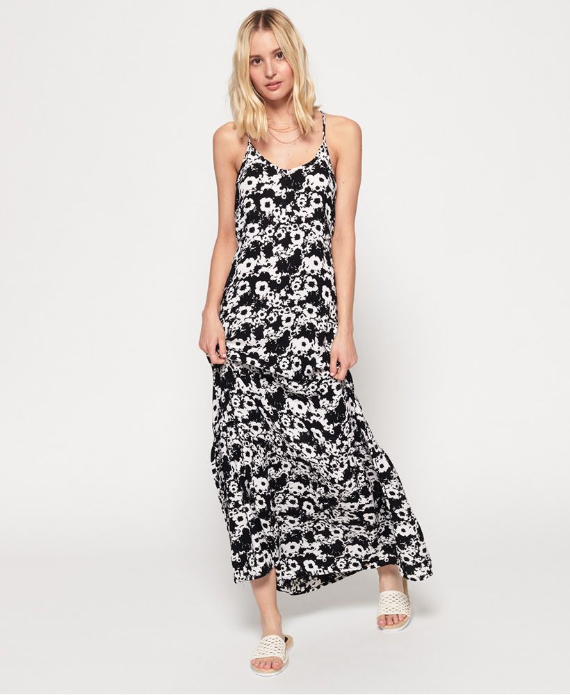 Superdry women’s Evee maxi dress. A feminine floaty maxi dress with adjustable shoulder straps and a racer back design. This elegant dress is perfect for this season and is finished with a subtle metal Superdry logo badge above the hem.