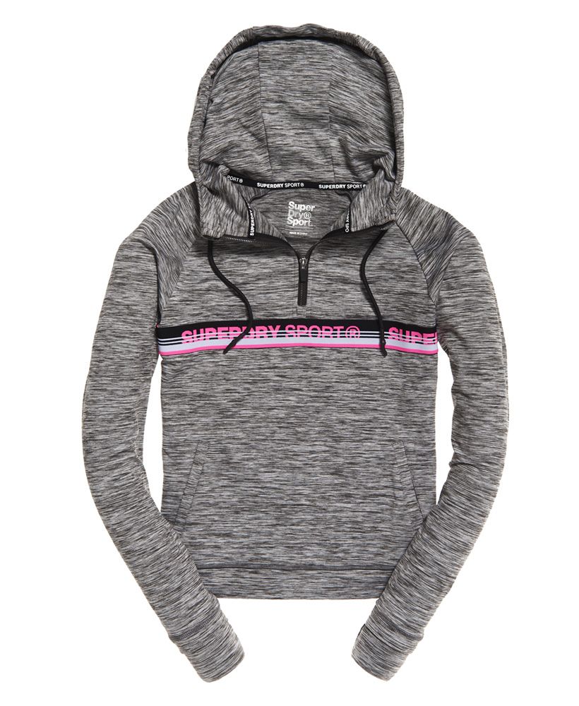 Superdry women's Core taped half zip hoodie. Combining style and comfort with technical performance, this hoodie has been crafted from a breathable fabric and uses moisture wicking technology to help keep you cool and comfortable as you smash your fitness goals. The hoodie features a drawstring hood with half zip fastening, a front pouch pocket and thumb holes in the cuffs. The hoodie is completed with Superdry Sport logo taping across the chest.Relaxed: A classic fit. Not too slim, not too tight – no distractions here