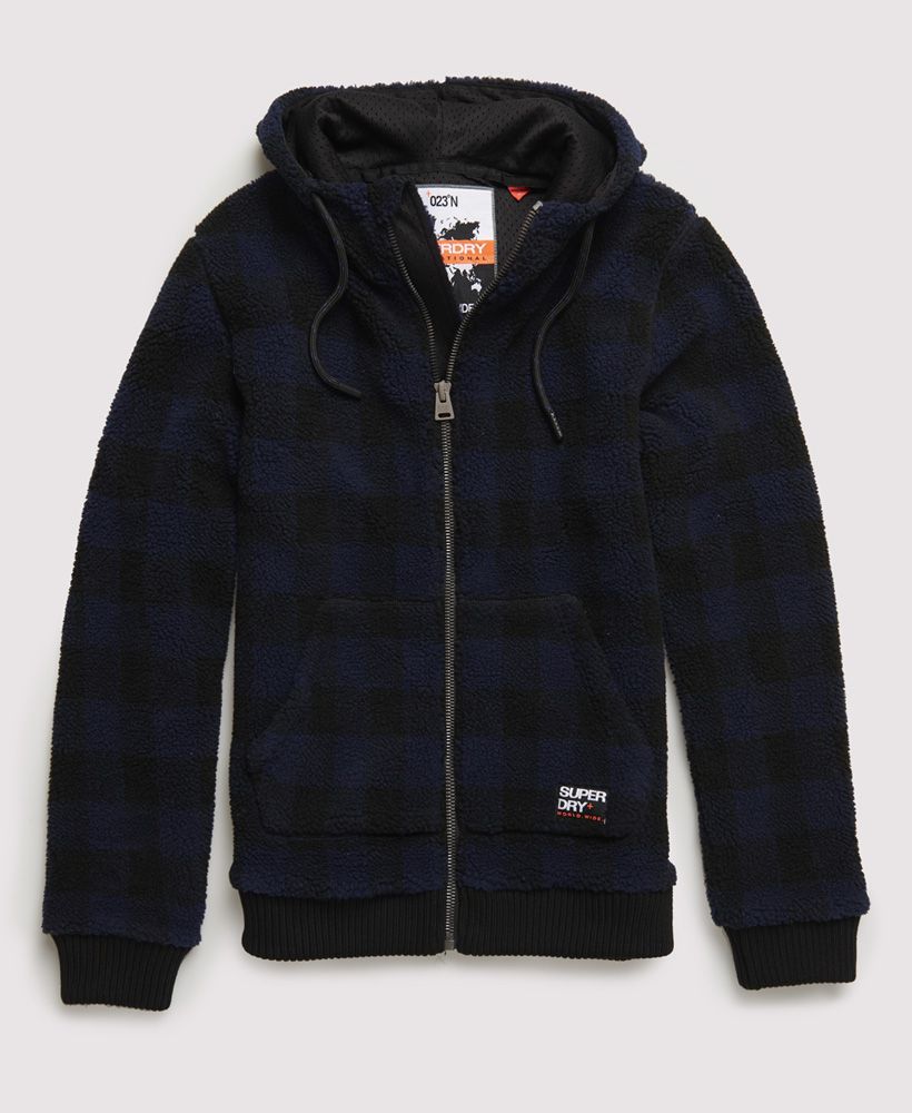 Superdry men's Core Sherpa zip hoodie. This soft sherpa hoodie features a drawstring hood, ribbed cuffs and hem, two front pockets and a zip fastening. The hoodie is finished with rubber Superdry logo badges on one sleeve and a Superdry logo tab on the pocket.