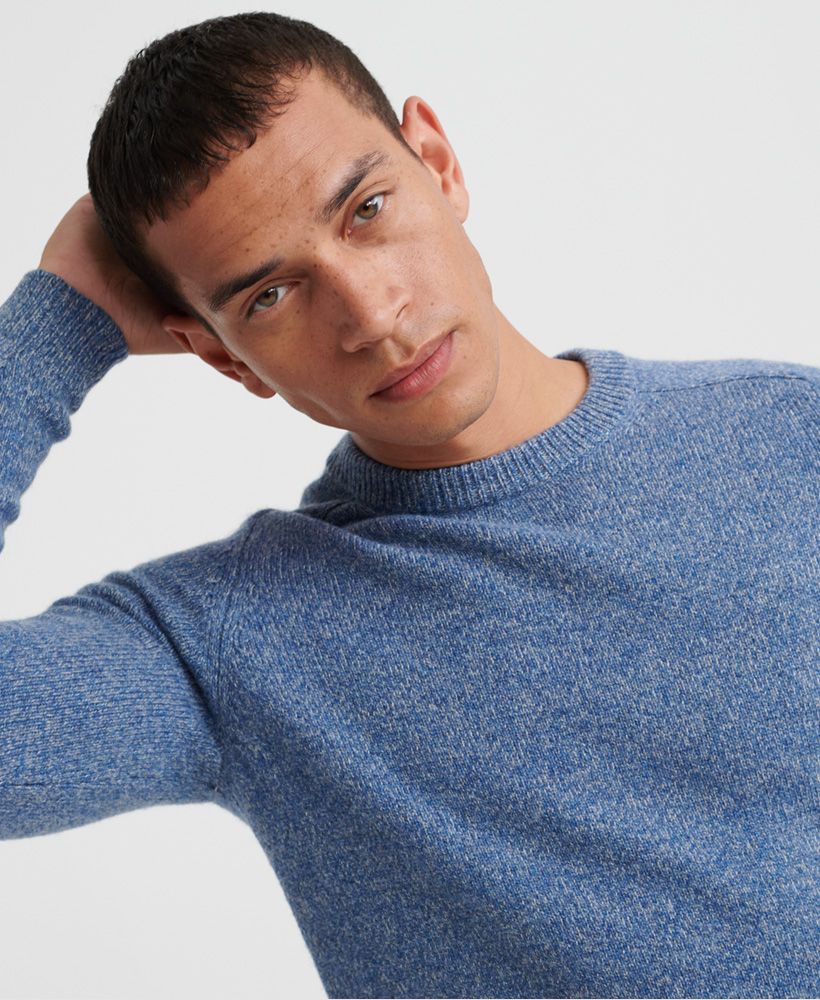 Superdry men's Harlow crew neck jumper. This soft and cozy jumper features a classic crew neck and ribbed hem and cuffs. Finished with a Superdry logo badge on one arm, this jumper is perfect for an everyday look this season.