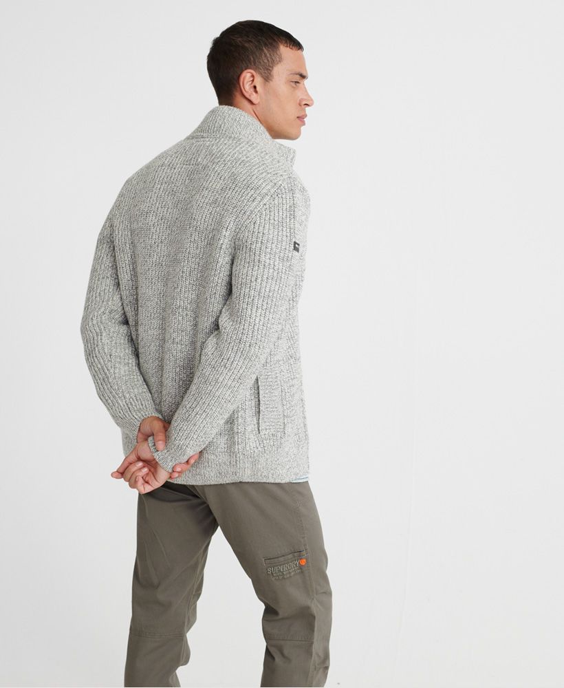 Superdry men's Downhill zip through cardigan. Update your knitwear this season with this cardigan, featuring a main zip fastening, a fleece lined collar and two pockets. Completed with a Superdry logo badge on one sleeve.