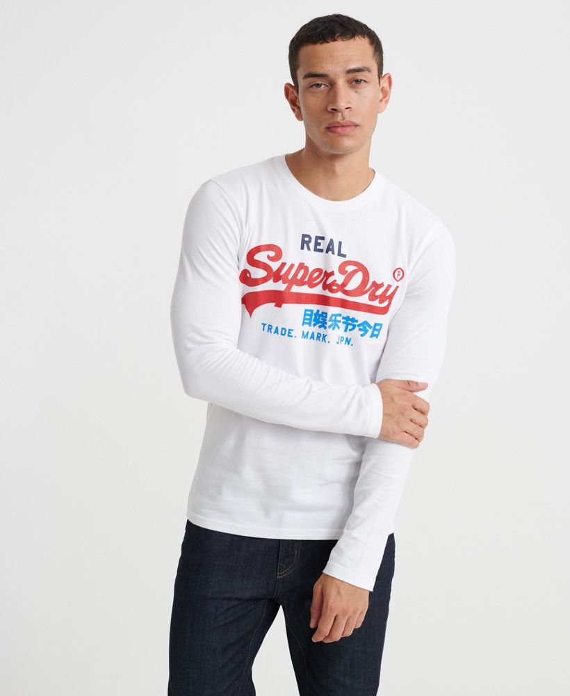 Superdry men's Vintage Logo Desert long sleeved t-shirt. This long sleeved t-shirt features a ribbed crew neckline and cracked Superdry logo effect on the chest. Wear with jeans and trainers for a stylish yet casual look.