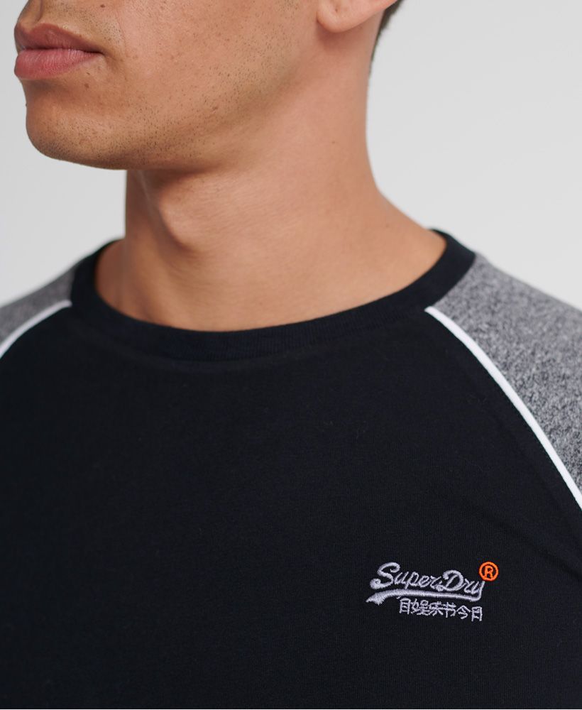 Superdry men's Orange Label desert Baseball top. Long sleeved tees are a staple in any wardrobe, give yours an update with this Orange label range baseball top. Featuring the classic orange Superdry stitching, Superdry orange label logo tab to one cuff and a embroidered Superdry log to the chest.