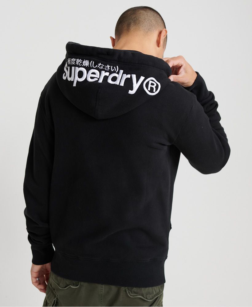 Superdry men's Modern Hit hoodie from the Orange Label range. This hoodie features a drawstring hood, ribbed cuffs and hem and a front pouch pocket. Complete with embroidered stripe detailing on the chest and an embroidered Superdry logo on the hood.