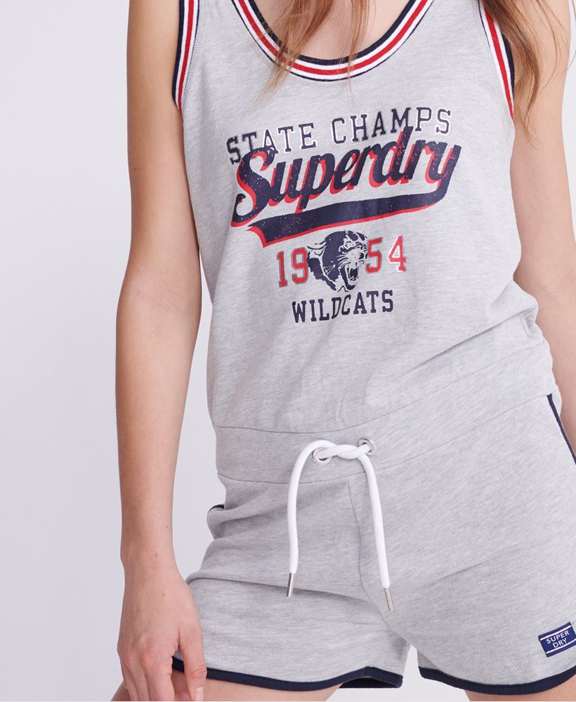 Superdry women's Riviera Sweat romper. This romper features an athletic design with a Superdry logo print across the chest and striped trim. Finished with a drawstring around the waist and a Superdry logo tab above the hem.