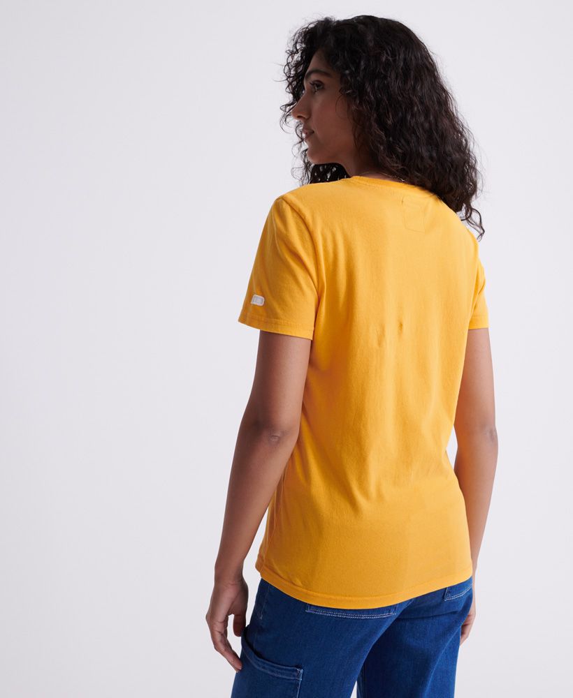 Superdry women's Flock t-shirt. Update your basics this season with this classic tee featuring a ribbed crew neck, Superdry flock logo across the chest and a Superdry logo badge on one sleeve. Pair with jeans and trainers to complete the look.Slim fit