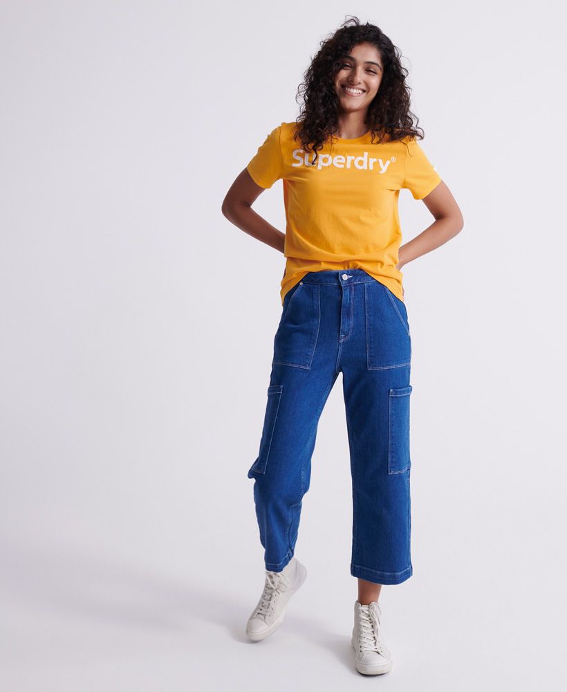 Superdry women's Flock t-shirt. Update your basics this season with this classic tee featuring a ribbed crew neck, Superdry flock logo across the chest and a Superdry logo badge on one sleeve. Pair with jeans and trainers to complete the look.Slim fit