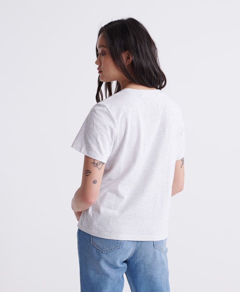 Superdry women's Track & Field T-shirt. Update your athleisure collection this season, this tee features a short sleeve design and a soft cotton blend fabric. Finished with a Superdry Track and Field logo on the chest.Slim fit