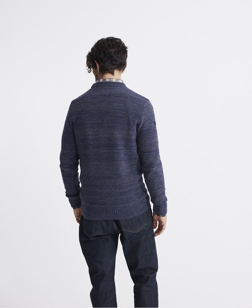 Superdry men's Keystone Crew Neck Jumper. This Jumper features a crew neck collar with ribbed detailling and ribbed hem and cuffs. Finished with a Superdry patch logo on one sleeve.