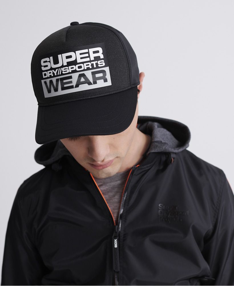 Superdry men's Sport cap. Part of our sports range this classic baseball cap features an adjustable back and eyelet detailling. Finished with a textured rubbersied Superdry logo on the front.