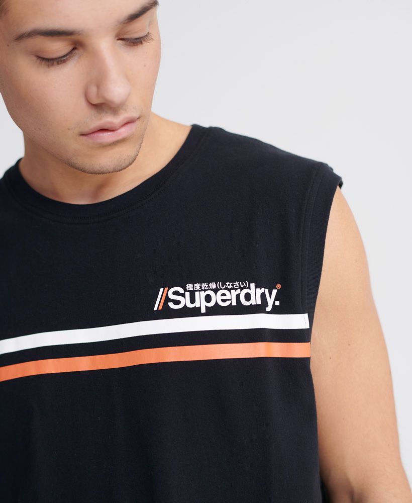 Superdry men's Core Logo Sport stripe vest. This vest features a ribbed crew neck and arm holes and a textured Superdry logo design across the chest. Complete with a Superdry logo tab featuring Japanese characters on one side seam. Pair with joggers and trainers for a post-gym look this season.