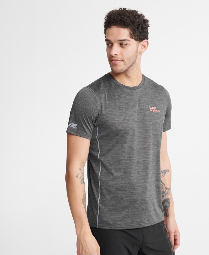 Superdry men's Training T-shirt. This short sleeve t-shirt features flatlock seams for your comfort, and is made with fabric designed to help keep you cool and dry, so you can train at your best for longer. Finished with reflective Superdry logos on the chest, sleeve, and back.Relaxed: A classic fit. Not too slim, not too tight – no distractions here