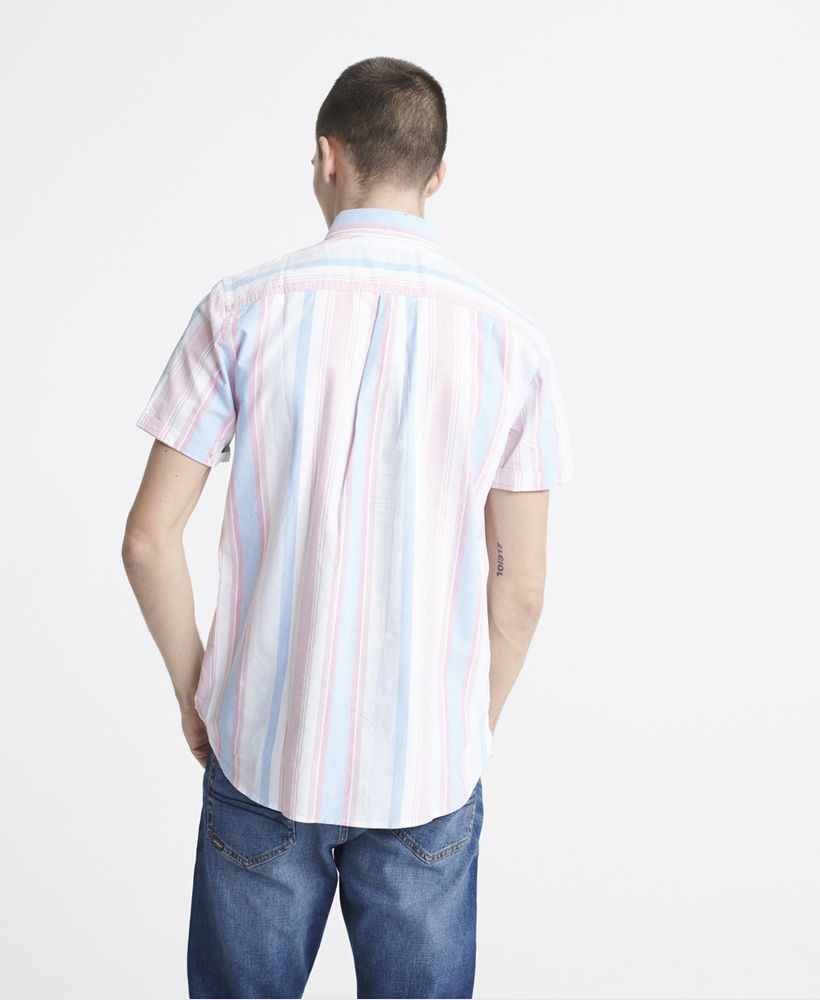 Superdry men's classic east coast Oxford short sleeved shirt. This short sleeve shirt features a a button down collar, split side seams, button fastening and a single breast pocket. Finished with an all over striped design and a Superdry patch logo on the placket.