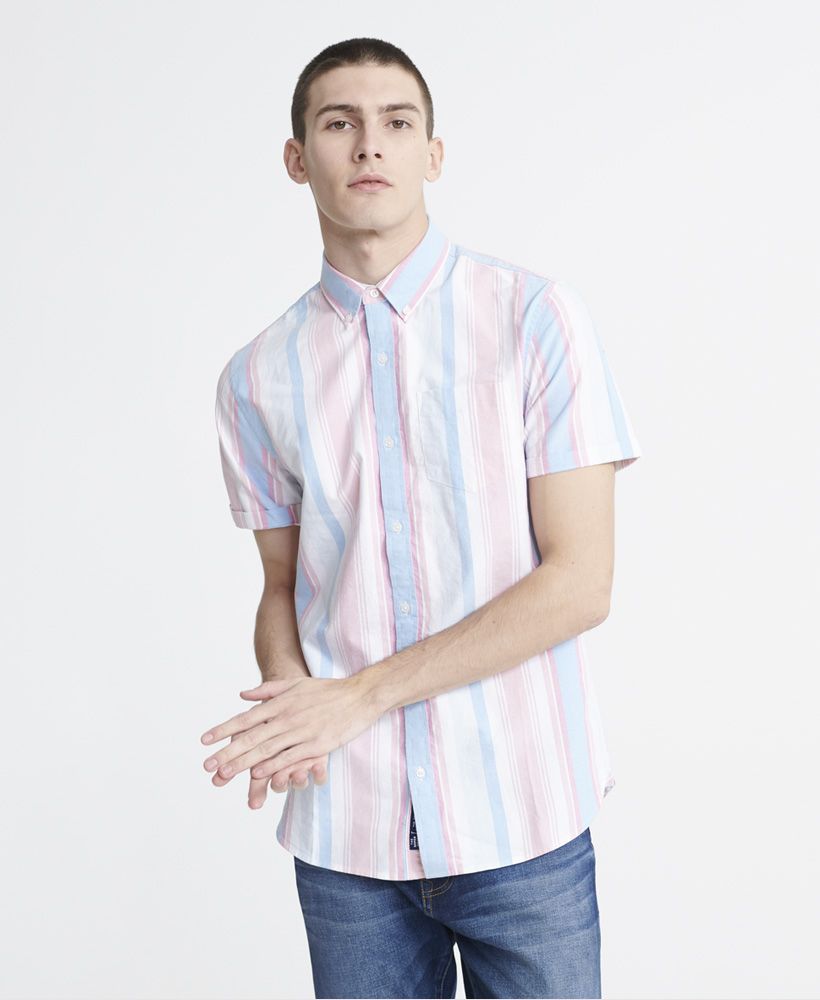 Superdry men's classic east coast Oxford short sleeved shirt. This short sleeve shirt features a a button down collar, split side seams, button fastening and a single breast pocket. Finished with an all over striped design and a Superdry patch logo on the placket.