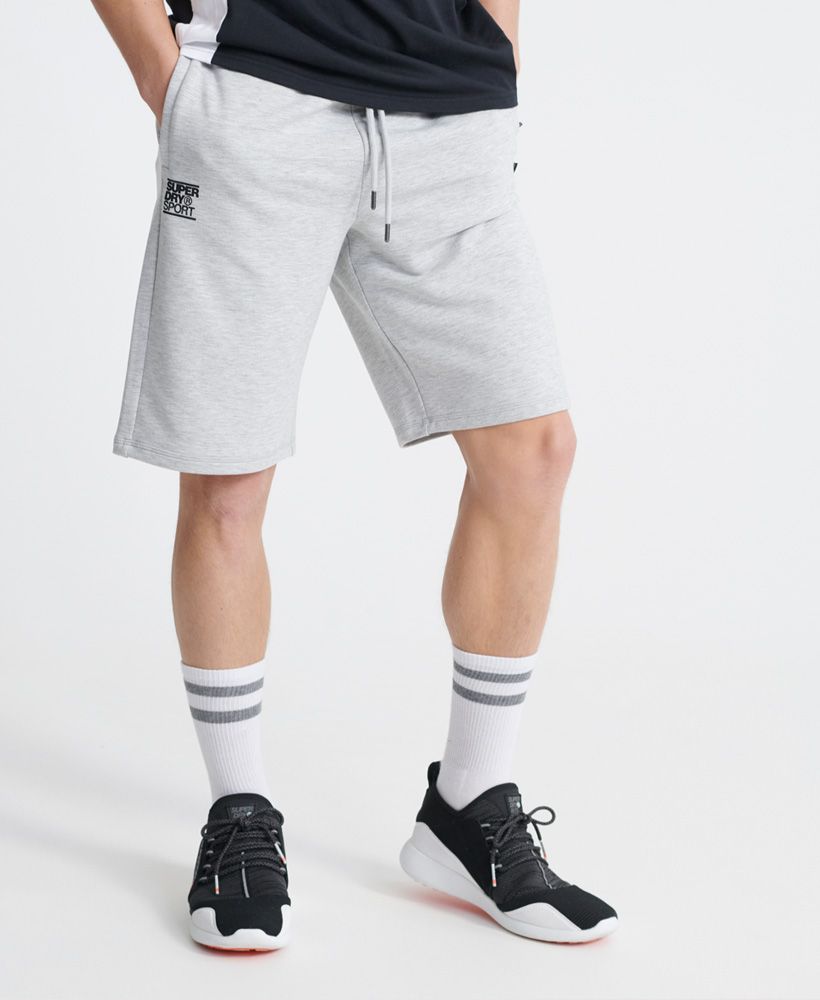 Superdry men's Training flex shorts. These comfortable training shorts are made with Superdry fabric that helps you to stay dry and cool so you can train at your best for longer. Featuring an elasticated drawstring waist, four-way stretch fabric, and two zip fastened pockets. Finished with a Superdry sport logo on on leg, and a Superdry logo tab on the side seam.Relaxed: A classic fit. Not too slim, not too tight – no distractions here