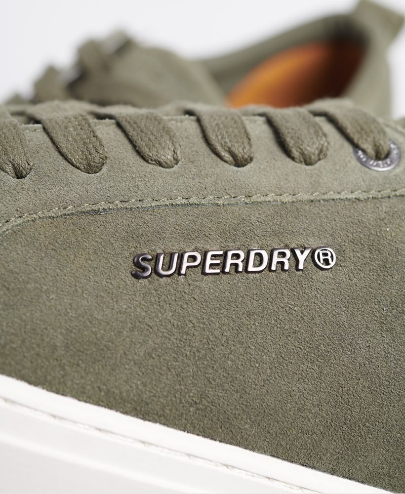 Superdry men's Truman Premium lace up trainers. Stay on trend this season with these trainers featuring a suede material for a formal look, lace up fastening, pull on tab and an anti scuff panel on the front of the sole. Finished with a metal Superdry logo on the side, debossed Superdry logo on the tongue and a embossed Superdry logo badge on the heel.