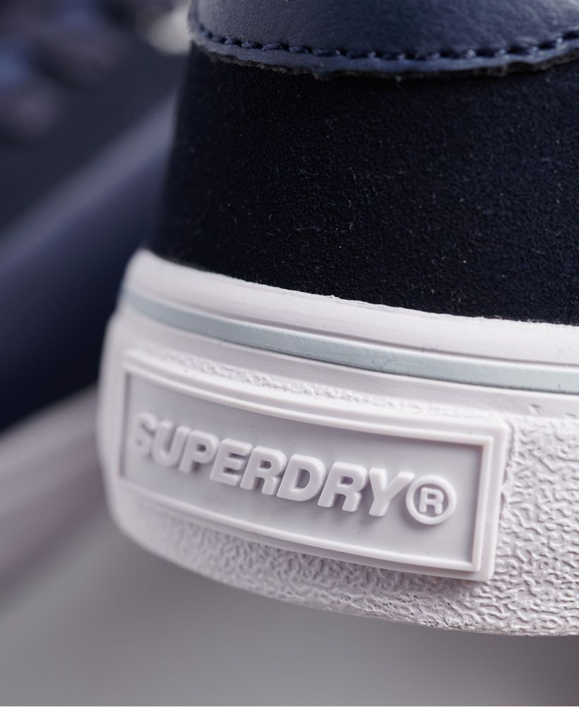 Superdry men's Skate classic low trainers. These comfy trainers feature a lace fastening, brightly coloured insoles, and camo printed soles. Finished with a printed Superdry logo on the tongue, and debossed Superdry branding on the sole.