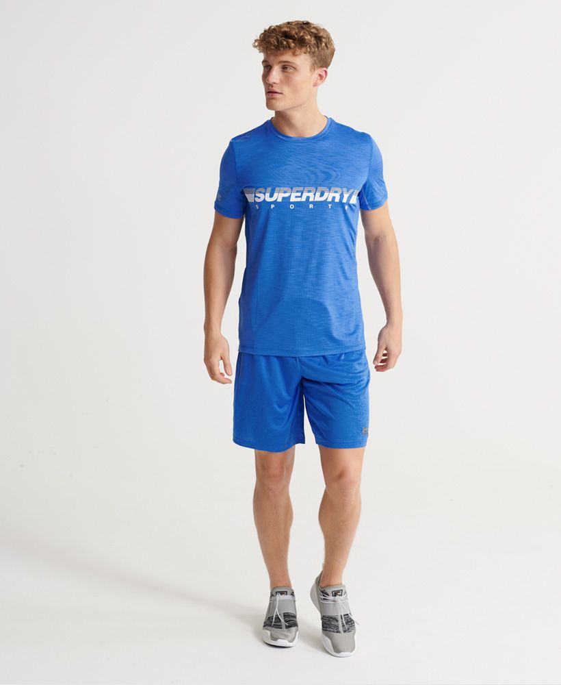 Superdry men's Training shorts. These stretchy and lightweight shorts are made from Superdry fabric, designed to keep you dry and cool for longer. Featuring a drawstring waist, two zip fastened pockets, and split side seams. Finished with a reflective Superdry logo above the hem.