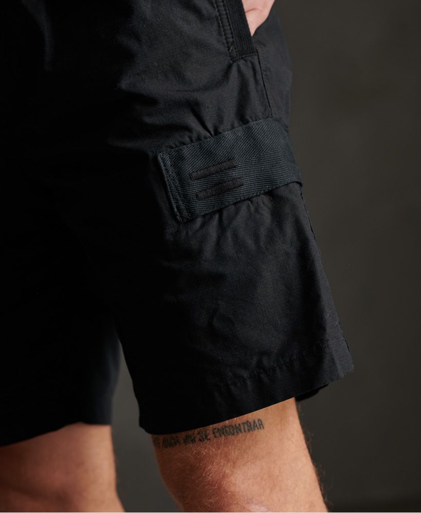 Too much to carry on the beach? Not a problem with the Utility cargo shorts, featuring a six pocket design; ideal for your essentials. These pure cotton shorts a sure to become a fast favorite.Zip and popper flyElasticated drawstring waistSix pocket designSignature logo patchRubberised logo