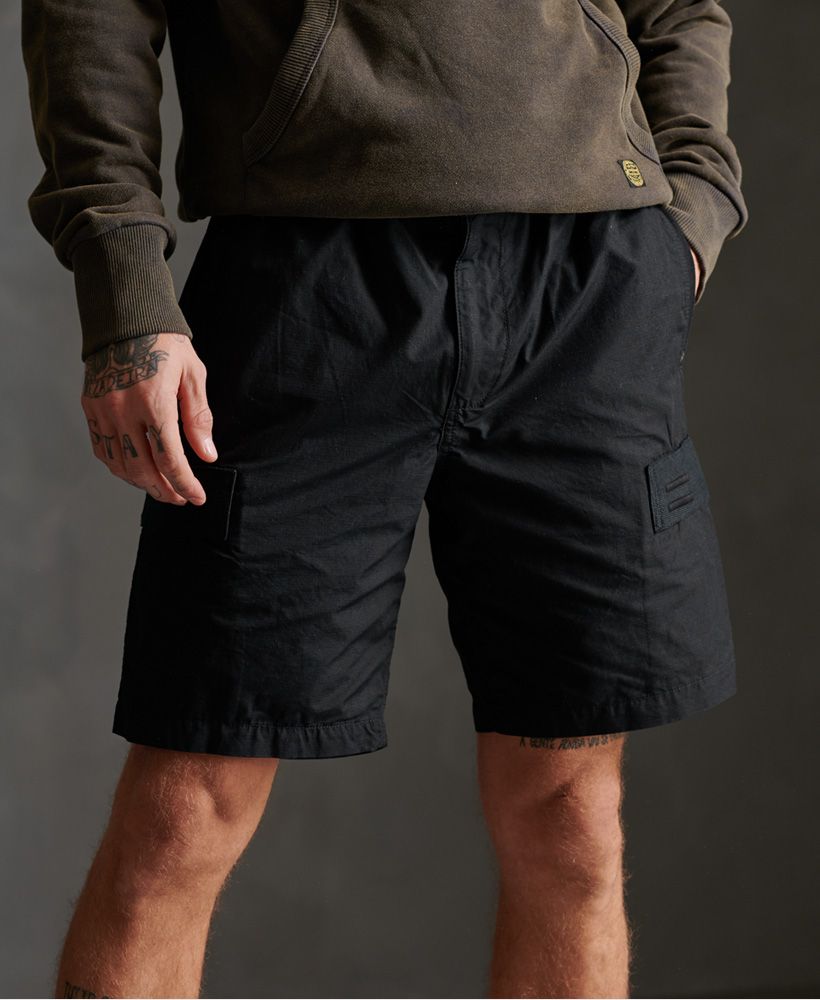 Too much to carry on the beach? Not a problem with the Utility cargo shorts, featuring a six pocket design; ideal for your essentials. These pure cotton shorts a sure to become a fast favorite.Zip and popper flyElasticated drawstring waistSix pocket designSignature logo patchRubberised logo