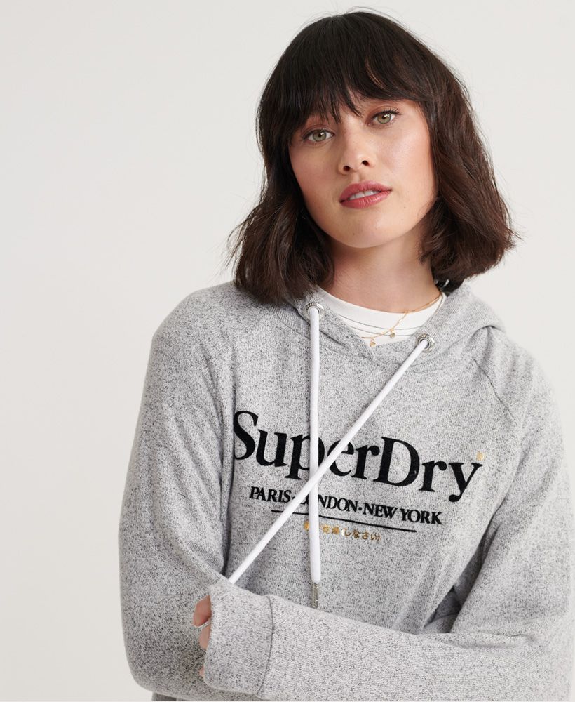 Designed with your comfort in mind, this super soft lightweight hoodie is just what you need to feel relaxed this season. Featuring a drawstring hood and a large pouch pocket; this hoodie is ideal for lazy days on the sofa.Drawstring adjustable hoodPouch pocketTextured logoSignature logo patch