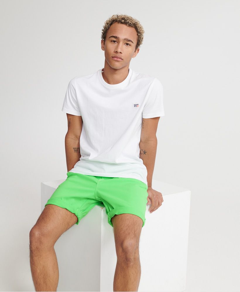 Superdry men's Sunscorched chino shorts. Be ready for the warmer weather with these shorts featuring an elasticated drawstring waistband, a button and zip fly fastening and a five pocket design. Finished with a Superdry logo patch on the back.Perfect for pairing with a vest top and flip flops for a beach ready look this season.