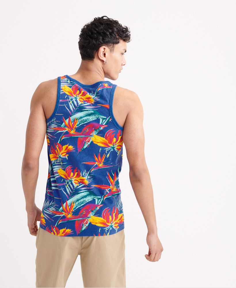 Superdry men's All Over Print supply vest top. Update your vest collection this season with this vest top featuring a ribbed trim on the neck and straps, an all over print design and an embroidered Superdry logo on the chest.