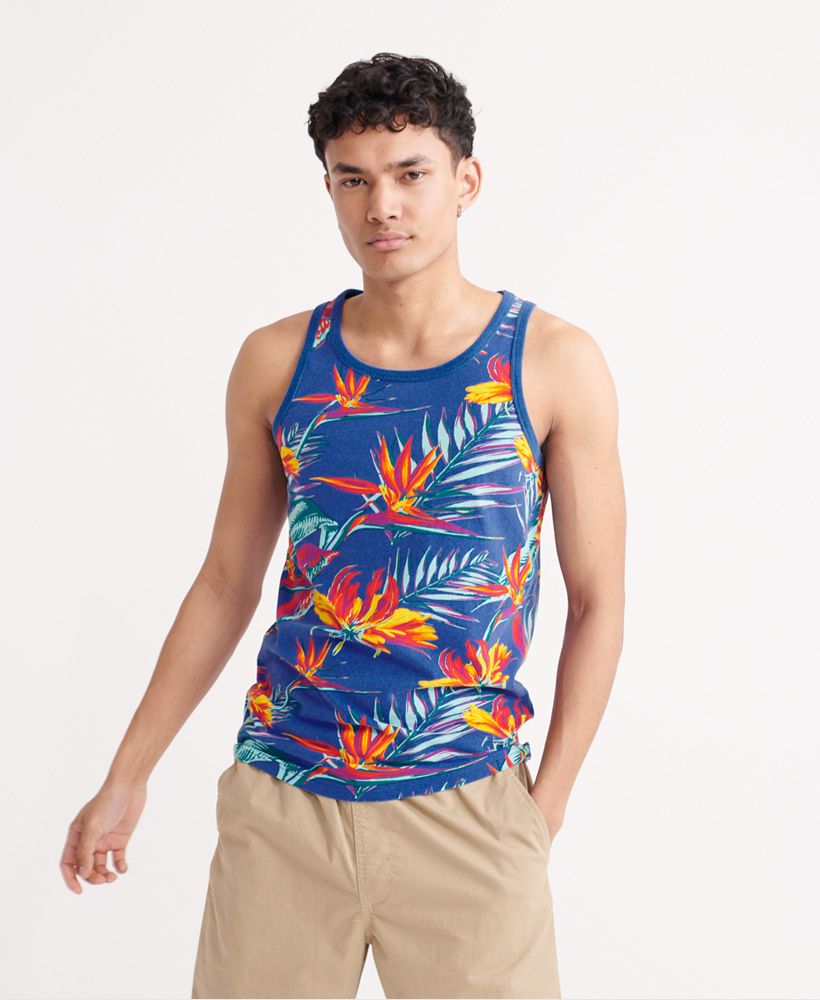 Superdry men's All Over Print supply vest top. Update your vest collection this season with this vest top featuring a ribbed trim on the neck and straps, an all over print design and an embroidered Superdry logo on the chest.