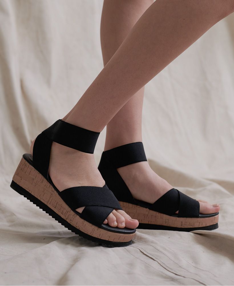 Need a pair of sandals that will go with just about any outfit you pick? Look no further with our Alchemy cork effect sandals. Designed to be simple but stylish so you can wear them with just about anything!Elasticated strapsSlip on shoesComfortable soleDebossed logoCork effect detailing