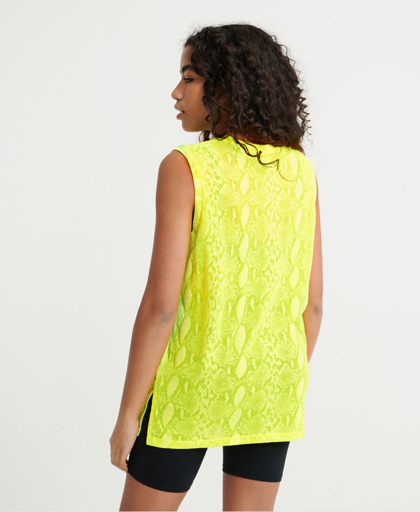 Superdry women's Urban burnout vest top. A twist on a classic vest top featuring a crew neck, sleeveless design, two side splits and an all over burnout snake print material. Finished with a Superdry logo tab on the hem.
