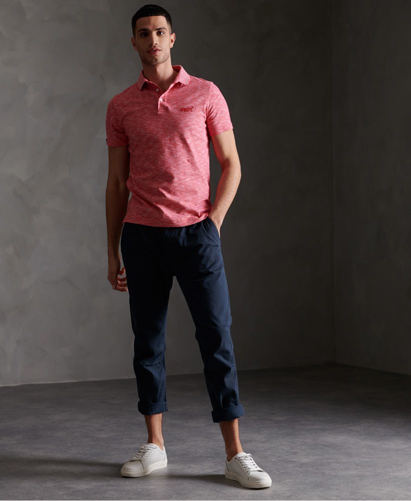 Update your polo collection with our new range of jersey polo shirts from the Orange Label range. With short sleeves, and a subtle embroidered logo you're bound to feel as good as you look.Single collarHalf button fasteningShort sleevesSplit side seamsEmbroidered logoSignature logo tab﻿Made with Organic Cotton - Made using cotton grown using organic farming methods which minimise water usage and eliminate pesticides, maximising soil health and farmer livelihoods.