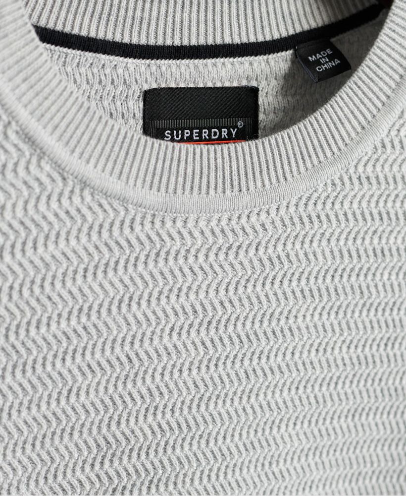 Don't sacrifice style for quality. With our Supima® cotton jumper you can have the best of both worlds. Supima® is a superior type of cotton that is designed to be softer than regular cotton, and last longer too. With our design, and Supima® technology, you can have great style and great quality. Crew necklineClassic rib knitSupima® cottonSignature metal logo badge