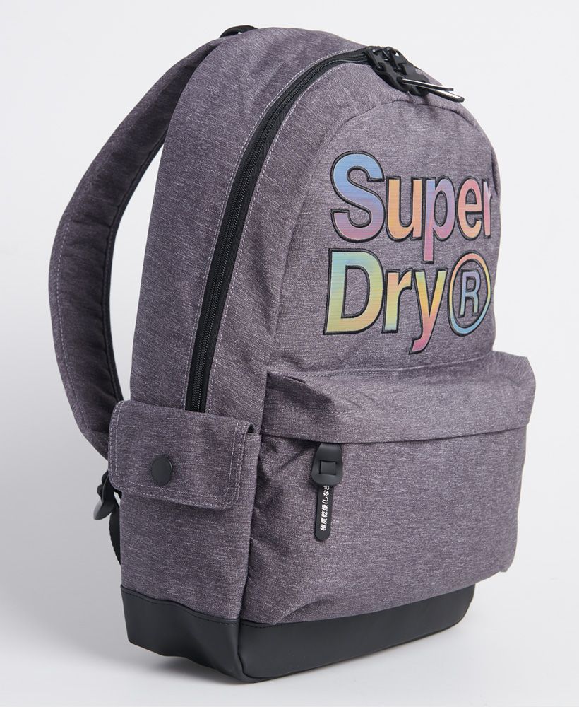 Make a statement with this rainbow rucksack. It's iridescent logo changes colour with direction, so you'll be sure to stand out from the crowd!Large Main compartmentFront compartmentSide pocketsZip fasteningsPopper fasteningsGrab HandleAdjustable StrapsLarge Superdry logoSuperdry logo patchH 46cm x W 30.5cm x D 13.5cm