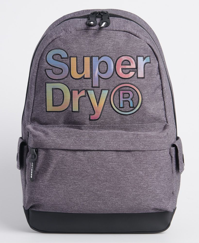 Make a statement with this rainbow rucksack. It's iridescent logo changes colour with direction, so you'll be sure to stand out from the crowd!Large Main compartmentFront compartmentSide pocketsZip fasteningsPopper fasteningsGrab HandleAdjustable StrapsLarge Superdry logoSuperdry logo patchH 46cm x W 30.5cm x D 13.5cm
