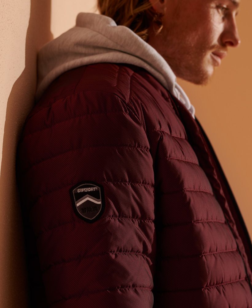 Keep the cold out in those chilly months while looking great with our classic Fuji padded jacket that features a padding made from 100% recycled polyester.Main zip fasteningTwo front zip fastened pocketsInternal breast pocketSignature logo badgeThe padding in this jacket is 100% Recycled Polyester – each jacket contains up to 10 recycled bottles, this avoids these bottles being sent to landfill or polluting our oceans.