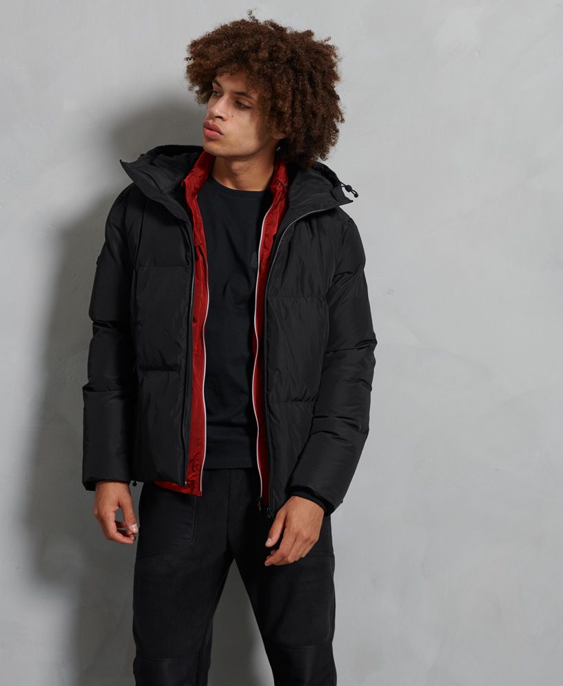 Staying warm in those colder months is essential and our Evolution puffer jacket does just the trick with its 100% recycled polyester padding.Main zipped fasteningBungee cord hoodDouble elasticated cuffTwo front zipped pocketsBungee cord hemQuilted jacketSignature logo badgeThe padding in this jacket is 100% Recycled Polyester – each jacket contains up to 10 recycled bottles, this avoids these bottles being sent to landfill or polluting our oceans.