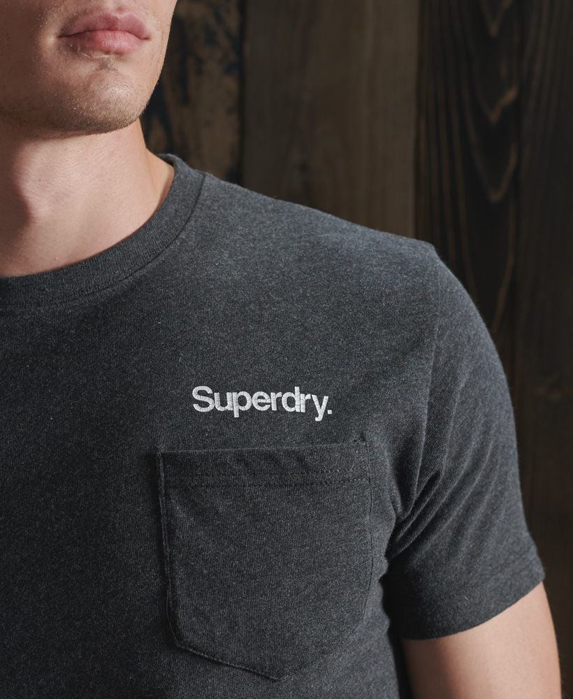 Simple but unique, the Core Logo Canvas tee features a slim fit design. Will look great paired with a classic cargo trouser to complete the look this season.Slim fit – designed to fit closer to the body for a more tailored lookClassic crew necklineShort sleevesSuperdry logo brandingSignature logo patchSingle Breast pocket