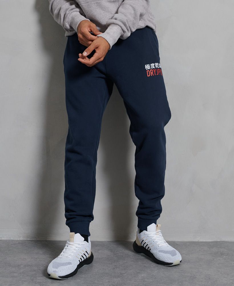 Perfect for leisure or lounging, these joggers feature an elasticated drawstring waistband and a soft fleece lining.Slim fit – designed to fit closer to the body for a more tailored lookElasticated drawstring waistbandSoft fleece liningTwo front pocketsRibbed waistband and cuffsTextured logo